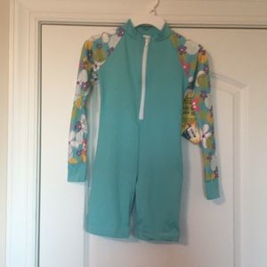 Light blue kids surf suit.